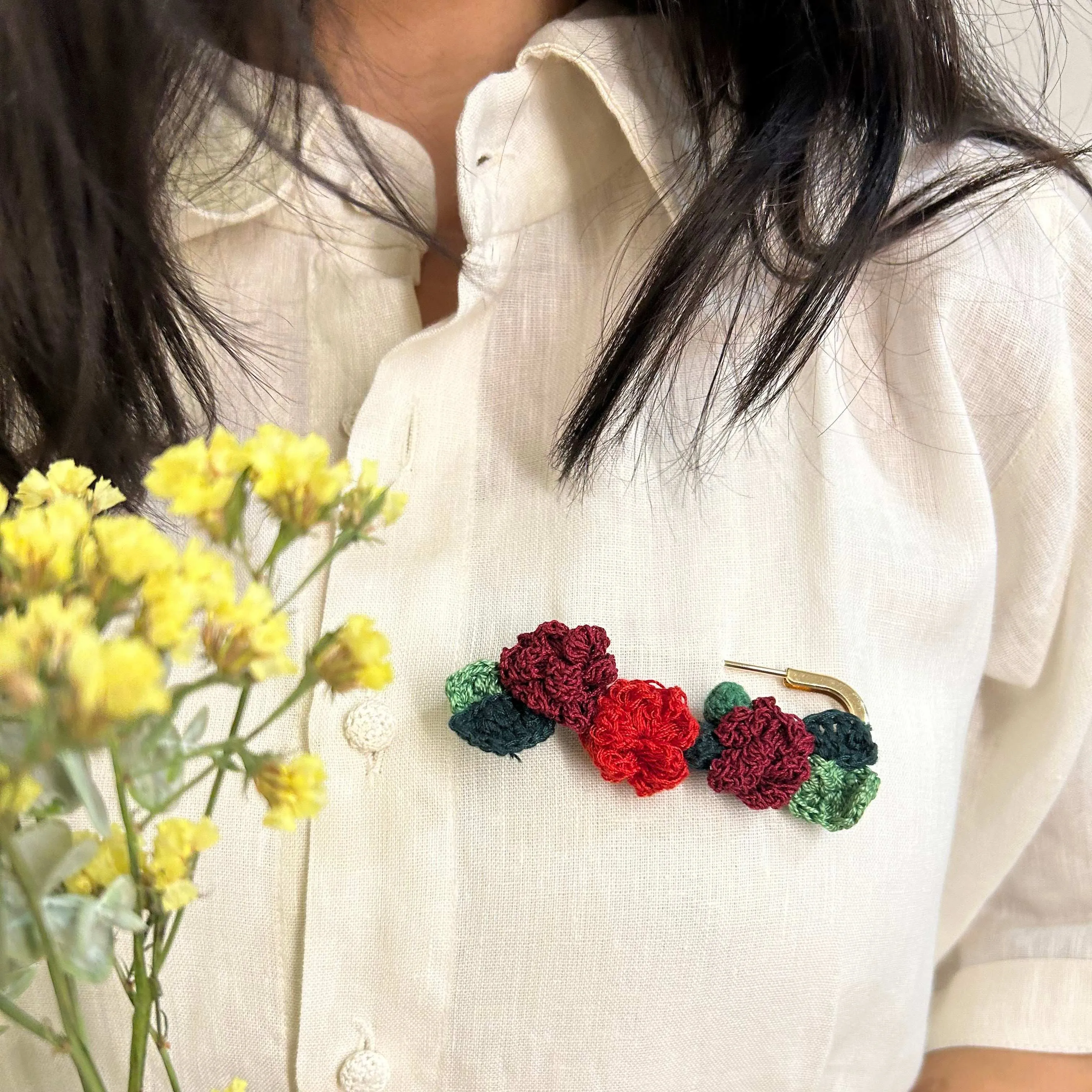 Rose crochet brooch on a metal pin